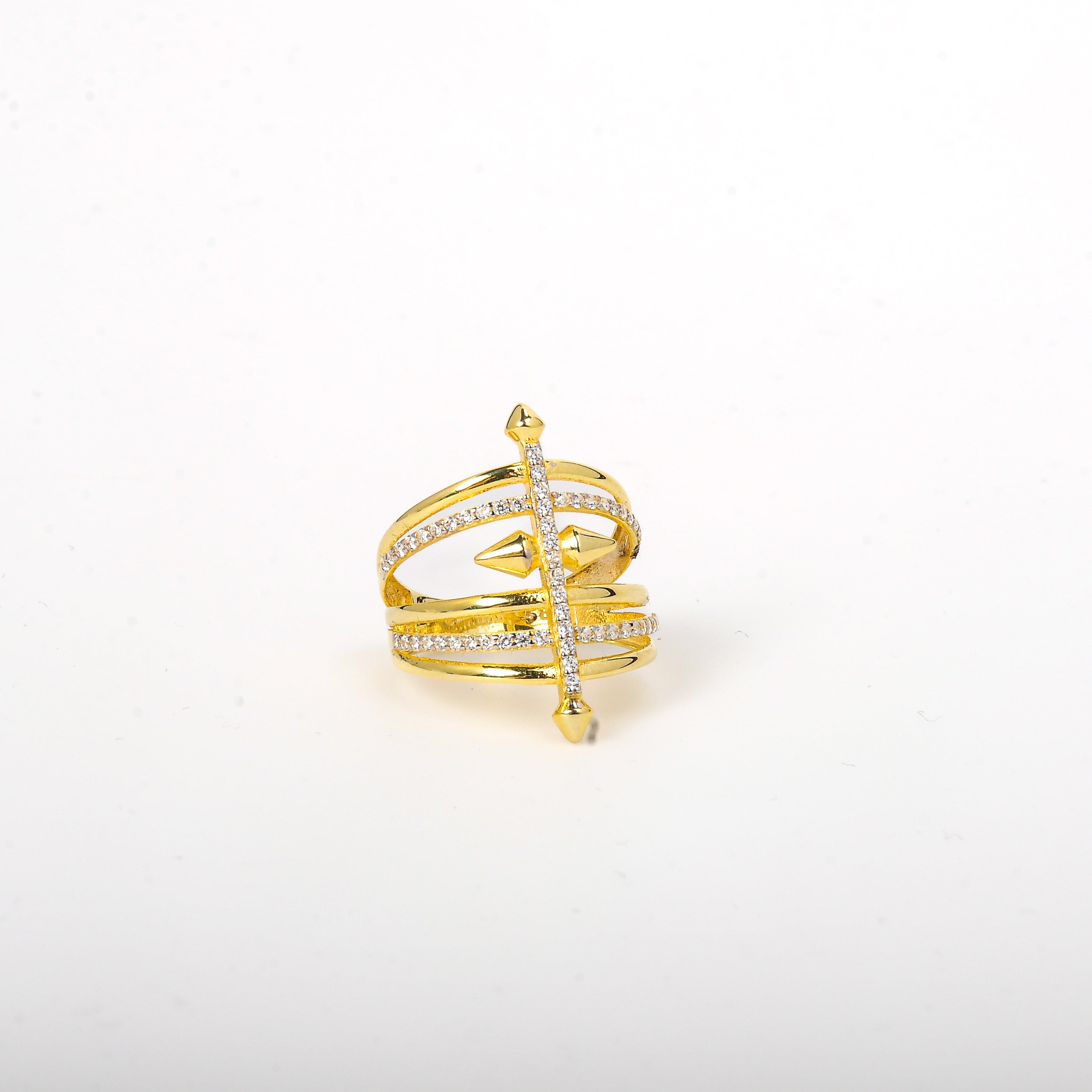 Gold ring with diamonds on a white background