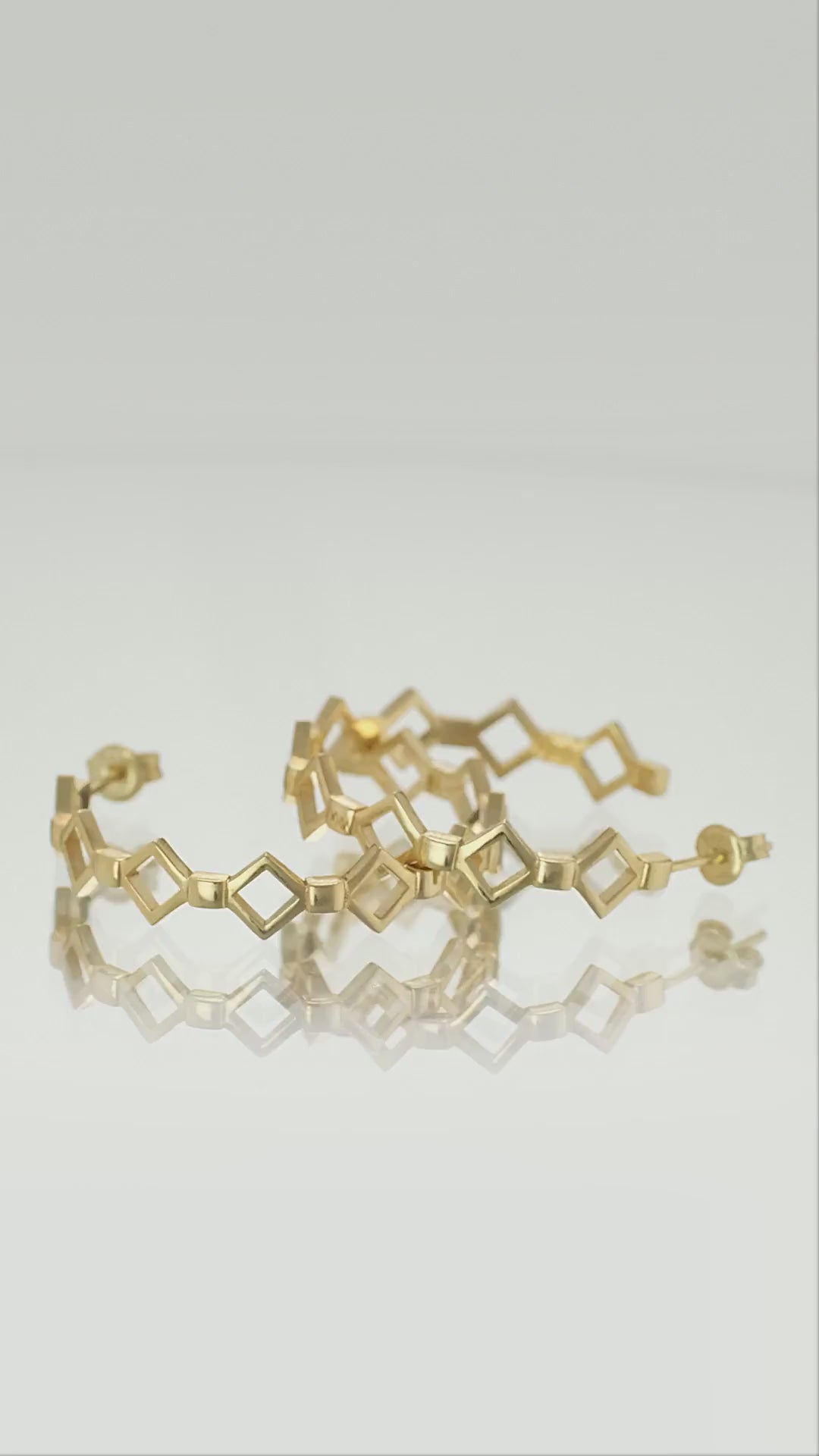 silhouette gold hoop earrings video