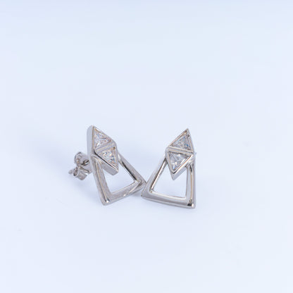 Pair of silver triangle-shaped earrings on a light gray background